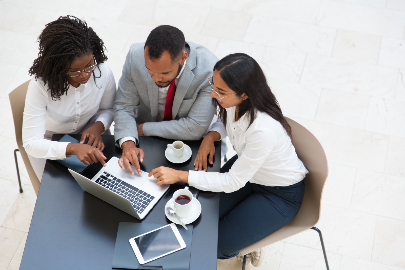 Emptech team reviewing a business system together